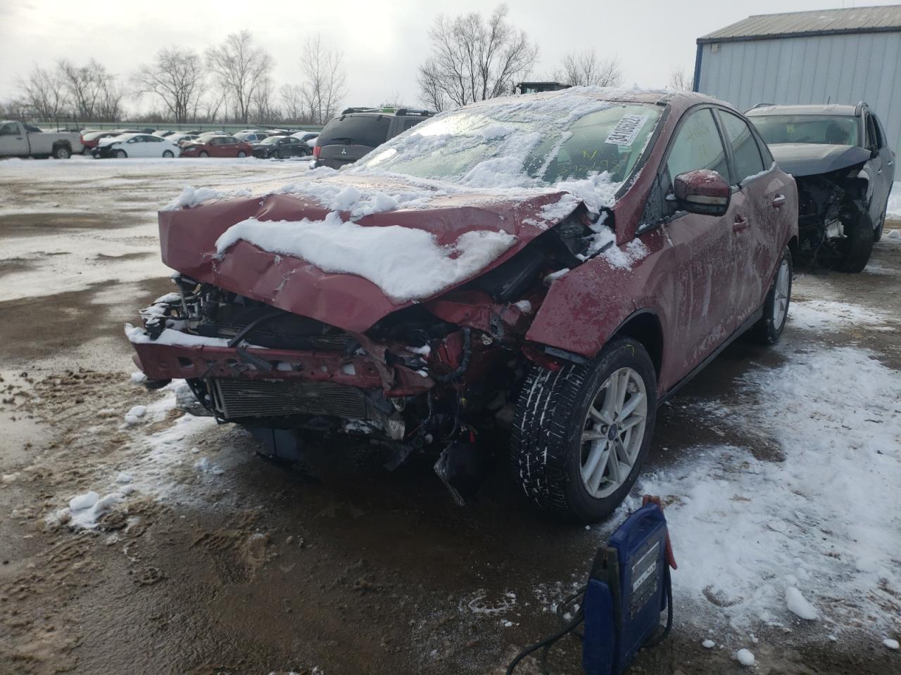 Photo 2 from auction – 2016 FORD FOCUS SE with VIN 1FADP3F27GL390195