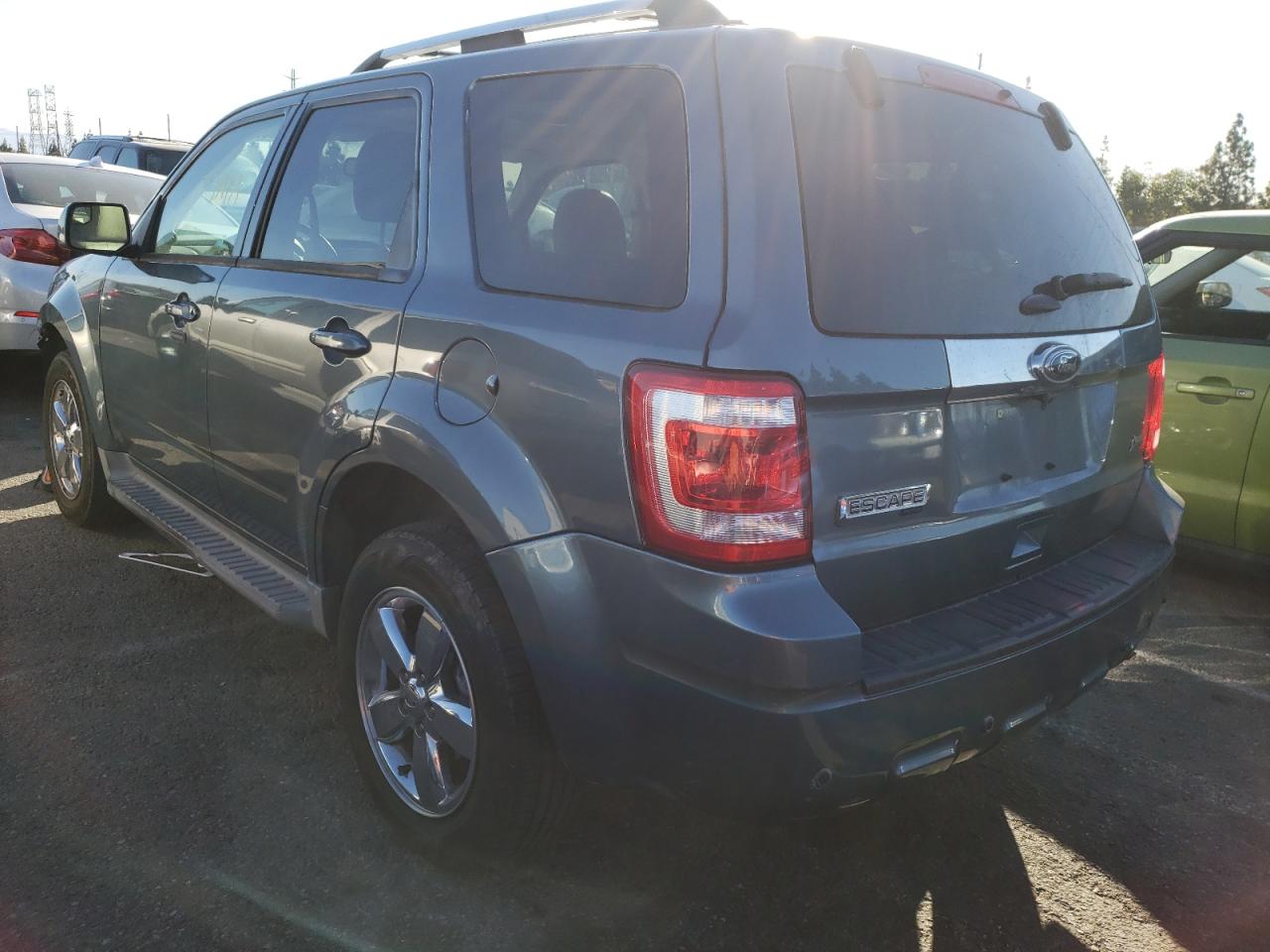 Photo 3 from auction – 2011 FORD ESCAPE LIM with VIN 1FMCU0EG1BKB29133