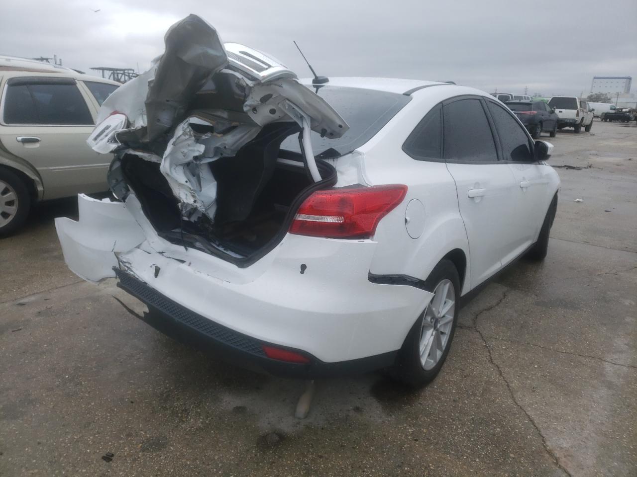 Photo 4 from auction – 2018 FORD FOCUS SE with VIN 1FADP3F25JL265803
