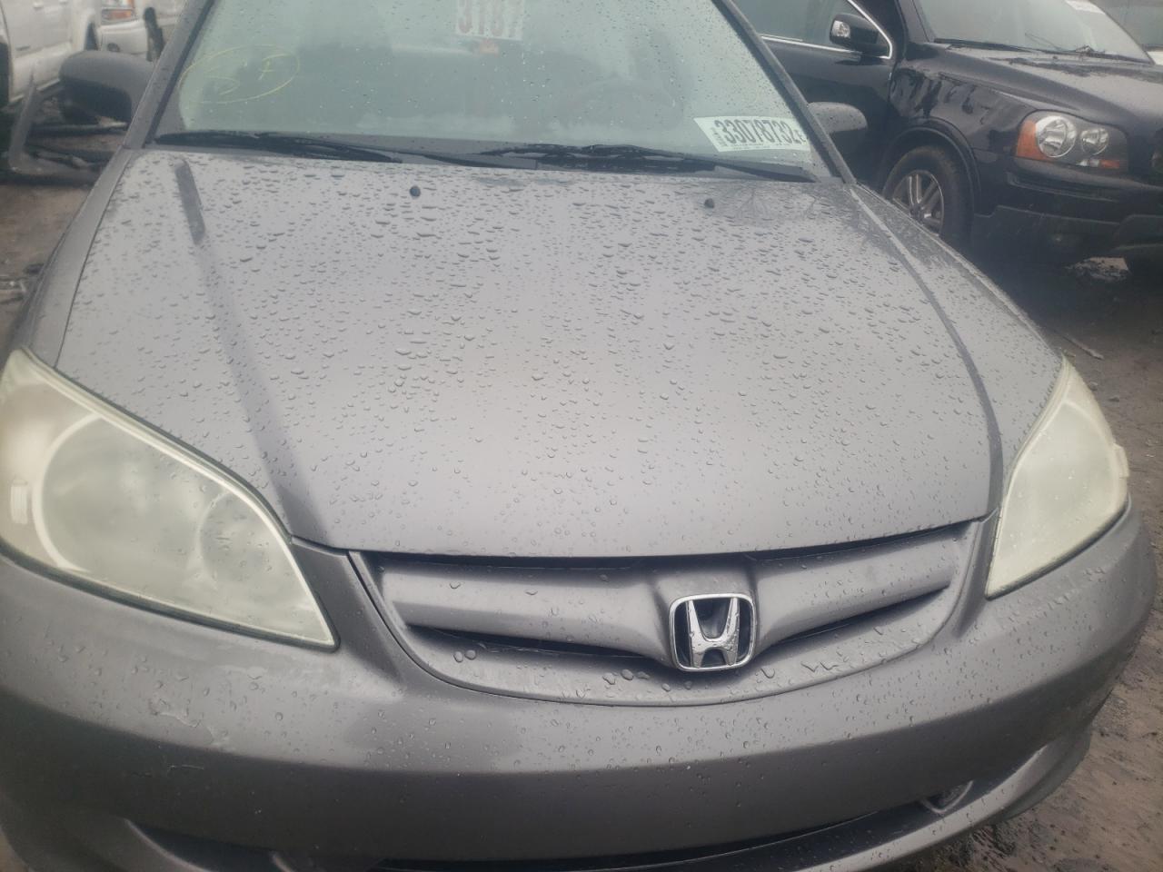 Photo 7 from auction – 2004 HONDA CIVIC LX with VIN 2HGES15554H627435