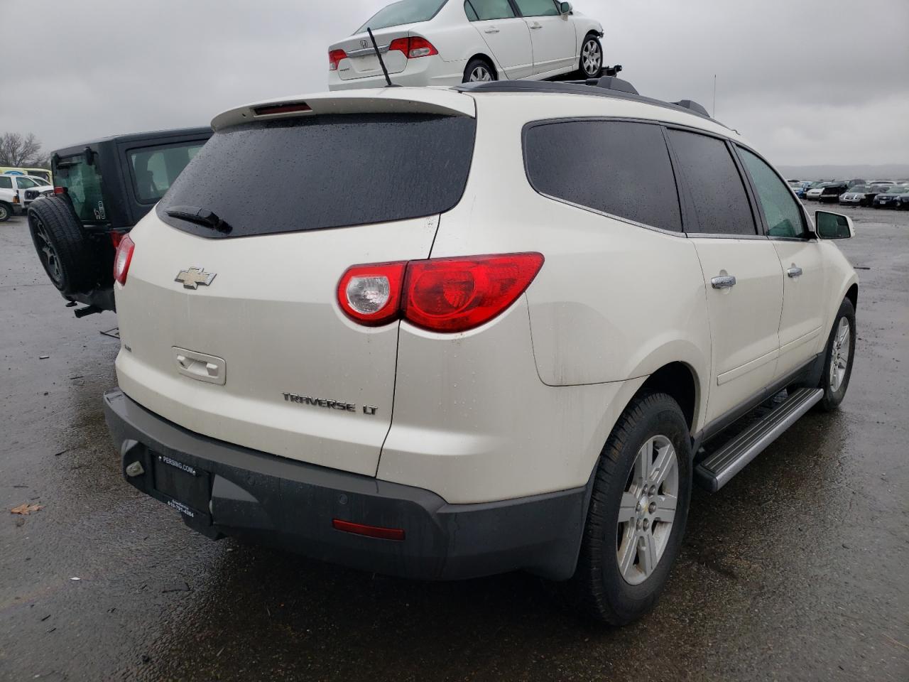 Photo 4 from auction – 2011 CHEVROLET TRAVERSE L with VIN 1GNKVGED3BJ128736