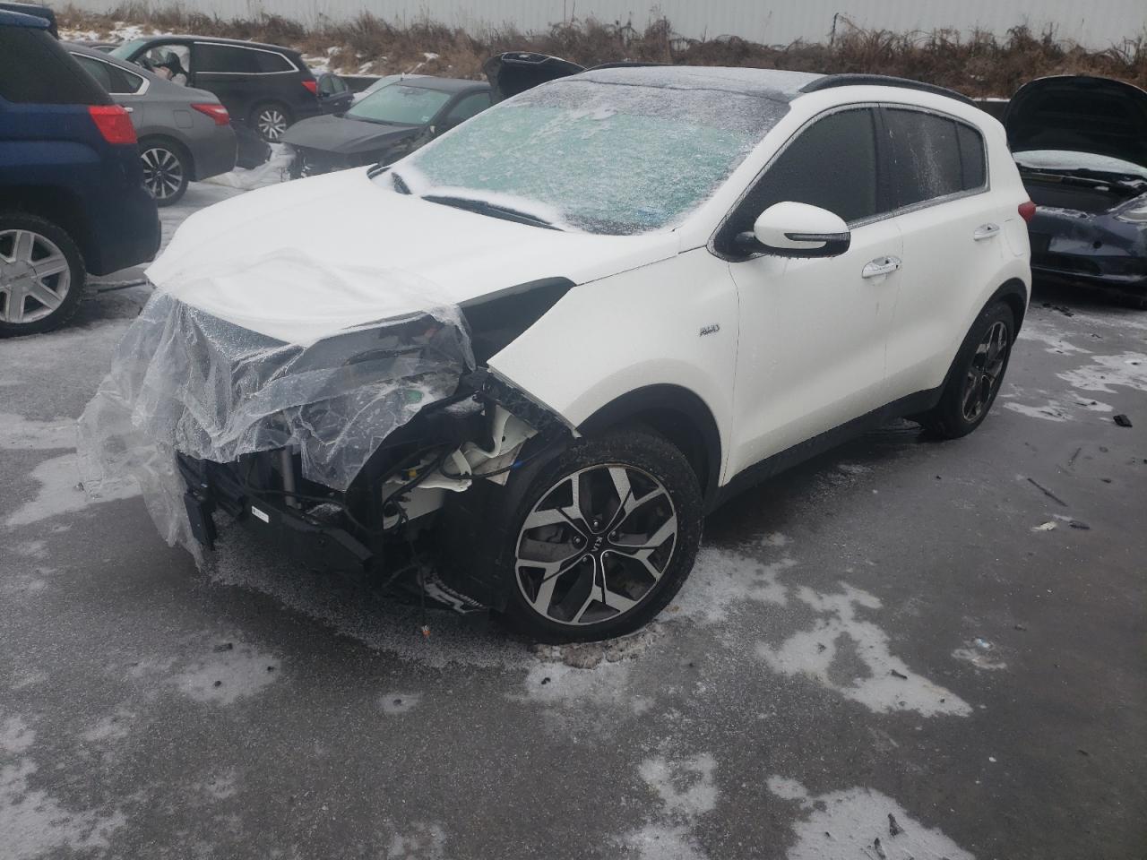 Photo 2 from auction – 2021 KIA SPORTAGE E with VIN KNDPNCAC0M7911601
