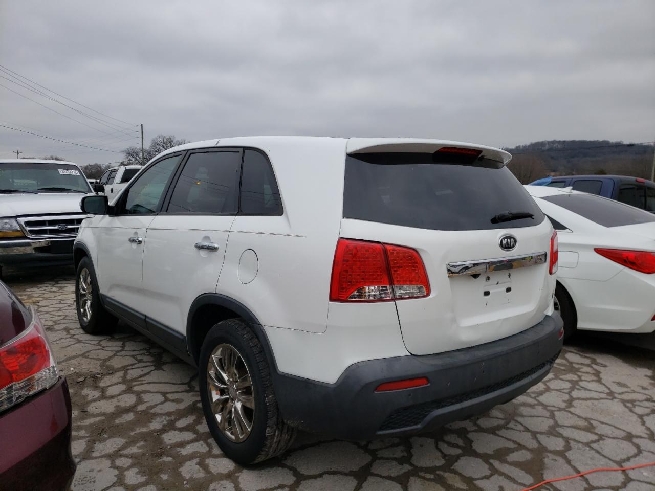 Photo 3 from auction – 2011 KIA SORENTO EX with VIN 5XYKU4A20BG017284