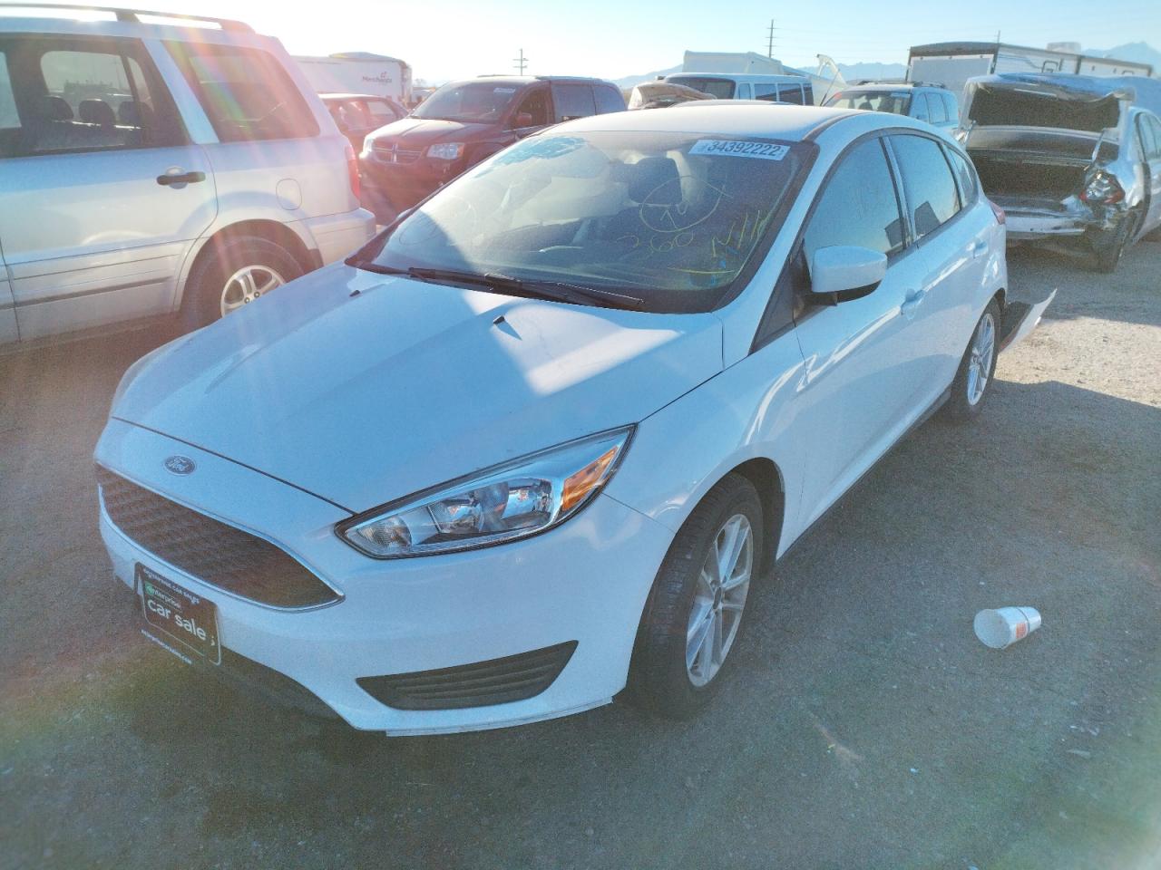 Photo 2 from auction – 2018 FORD FOCUS SE with VIN 1FADP3K23JL237231