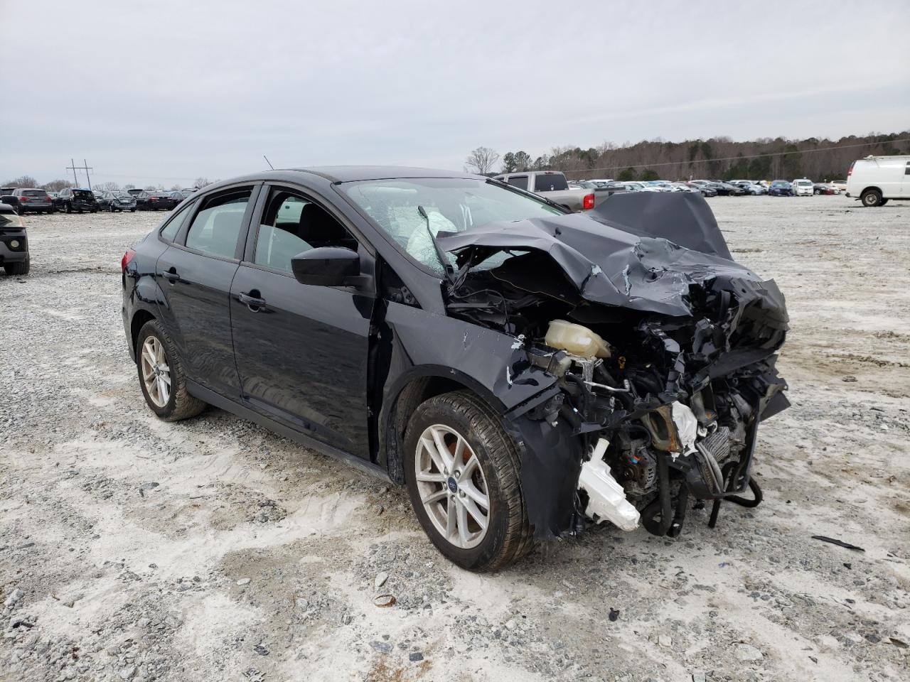 FORD FOCUS SE 2018 with VIN 1FADP3F22JL295437 - Photo from auction