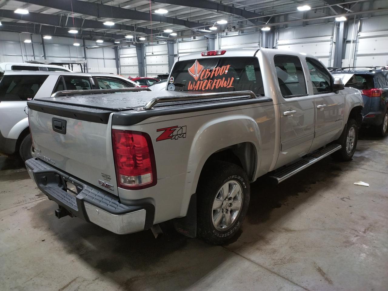 Photo 4 from auction – 2011 GMC SIERRA K15 with VIN 3GTP2WE32BG264690