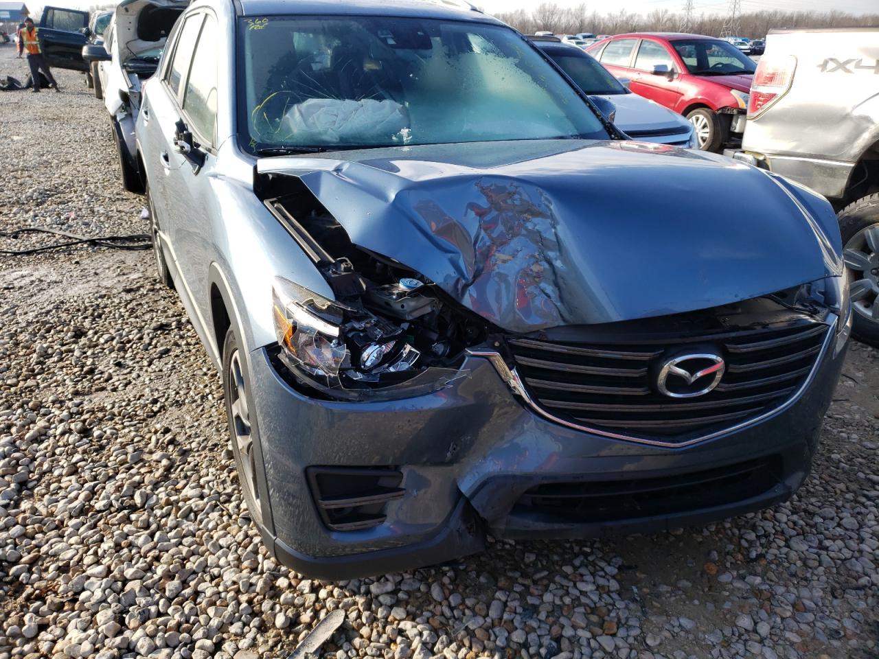 Photo 9 from auction – 2016 MAZDA CX-5 GT with VIN JM3KE2DY4G0805281