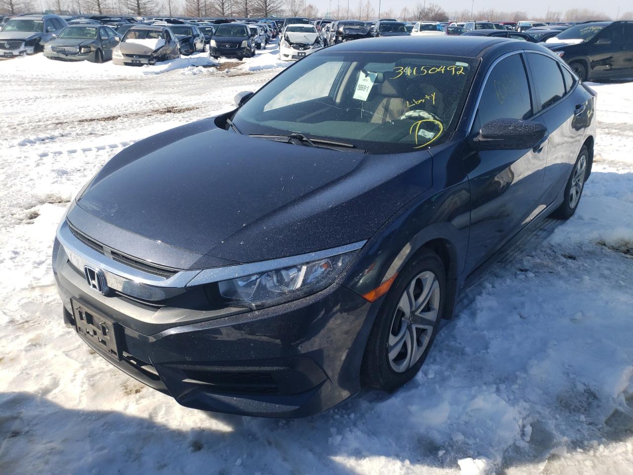 Photo 2 from auction – 2018 HONDA CIVIC LX with VIN 19XFC2F50JE037607