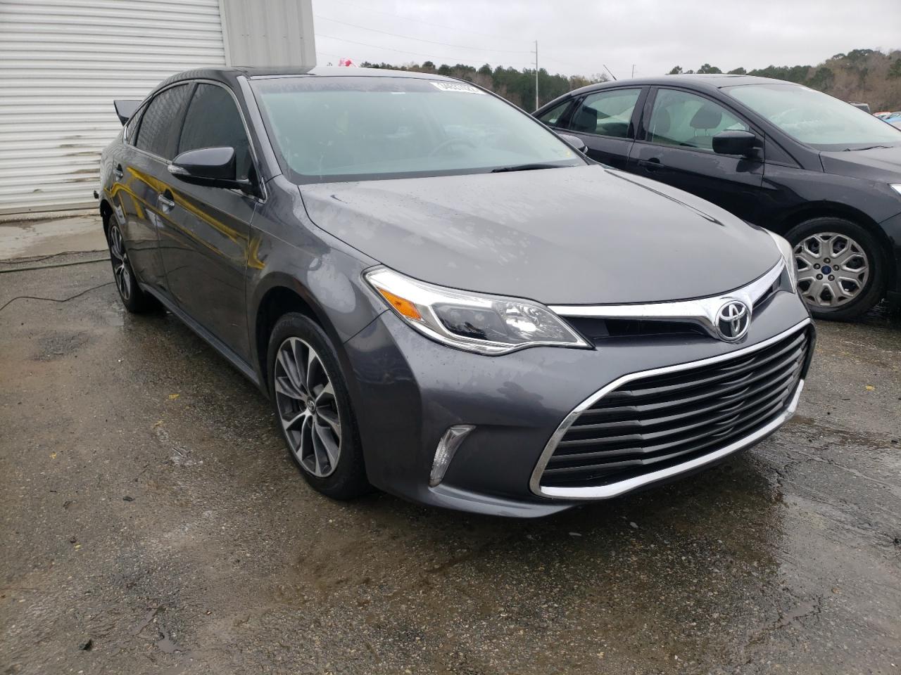 TOYOTA AVALON XLE 2016 with VIN 4T1BK1EB3GU233050 - Photo from auction