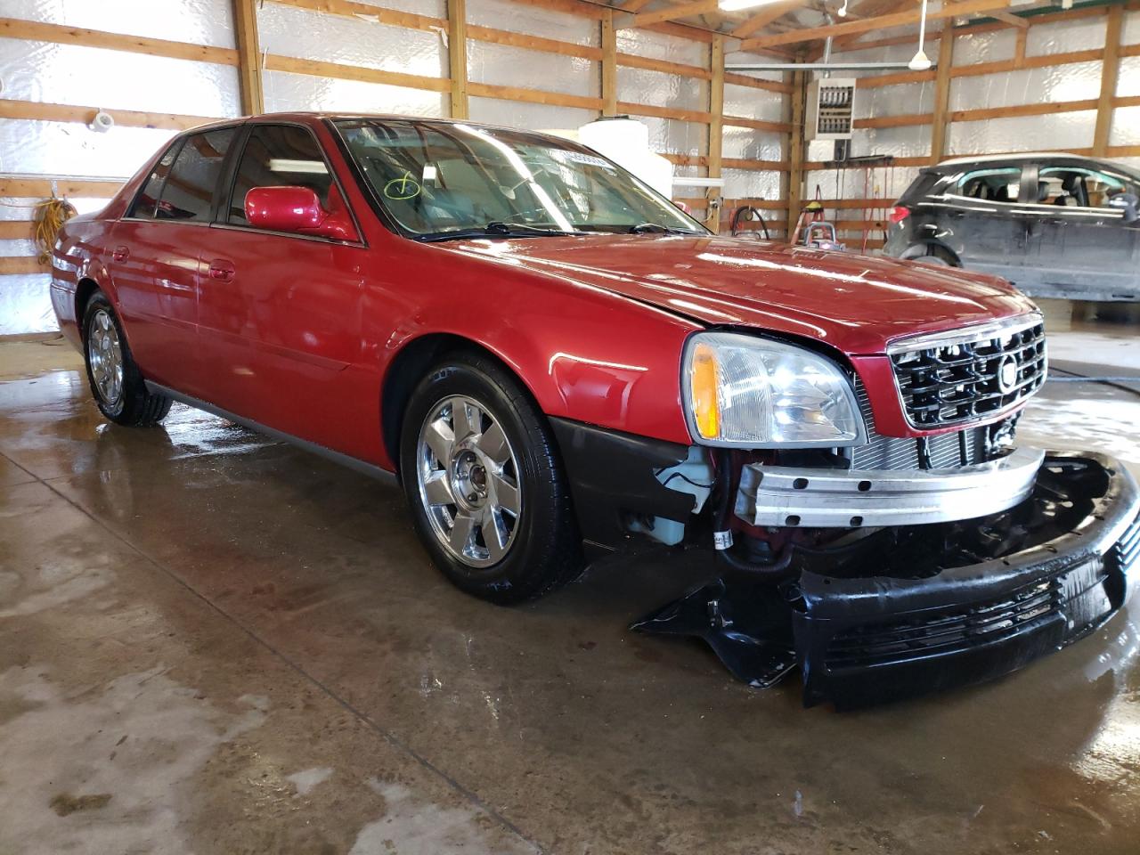 CADILLAC DEVILLE DH 2004 with VIN 1G6KE57YX4U133174 - Photo from auction