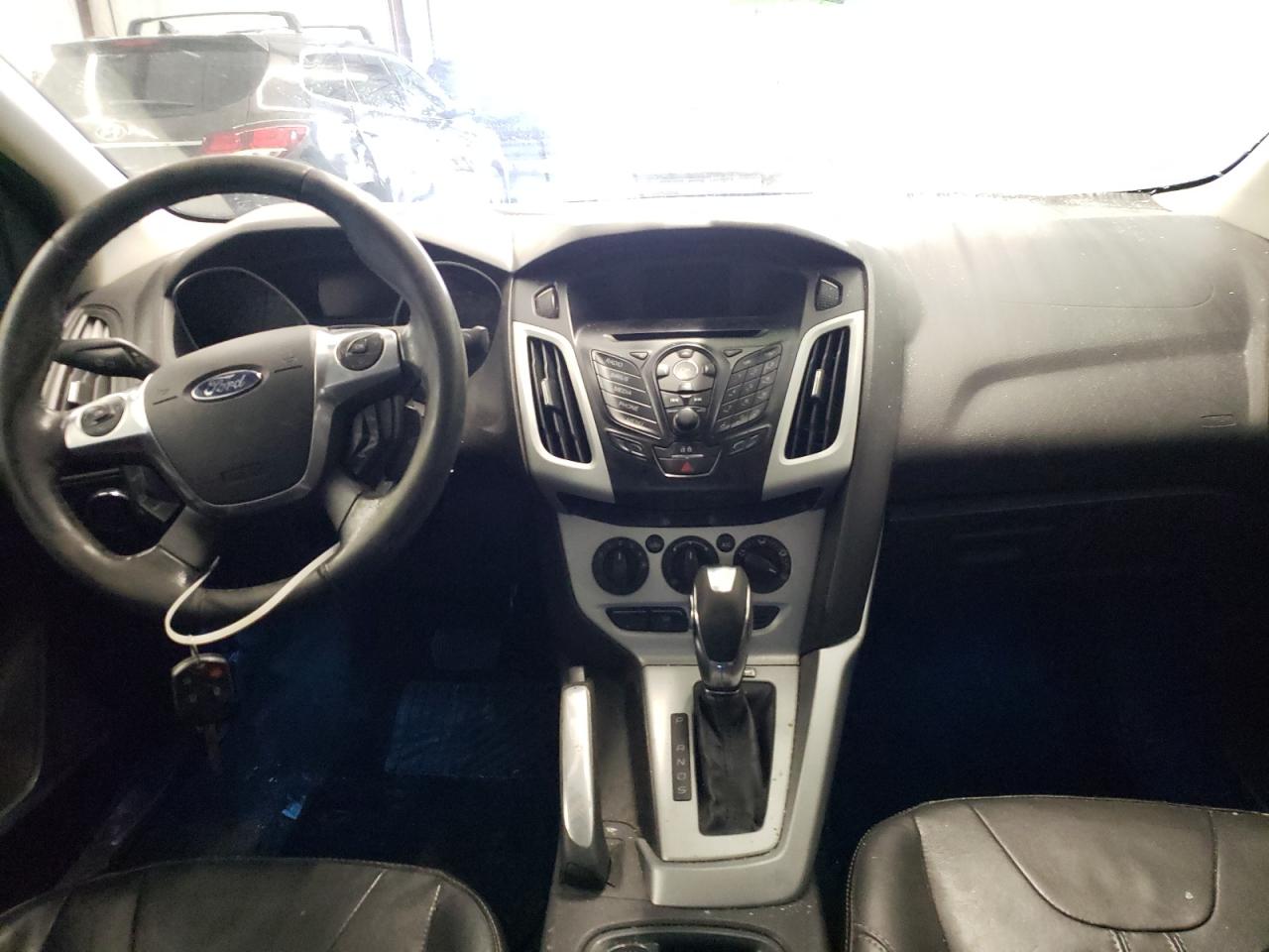 Photo 9 from auction – 2013 FORD FOCUS SE with VIN 1FADP3F20DL278933