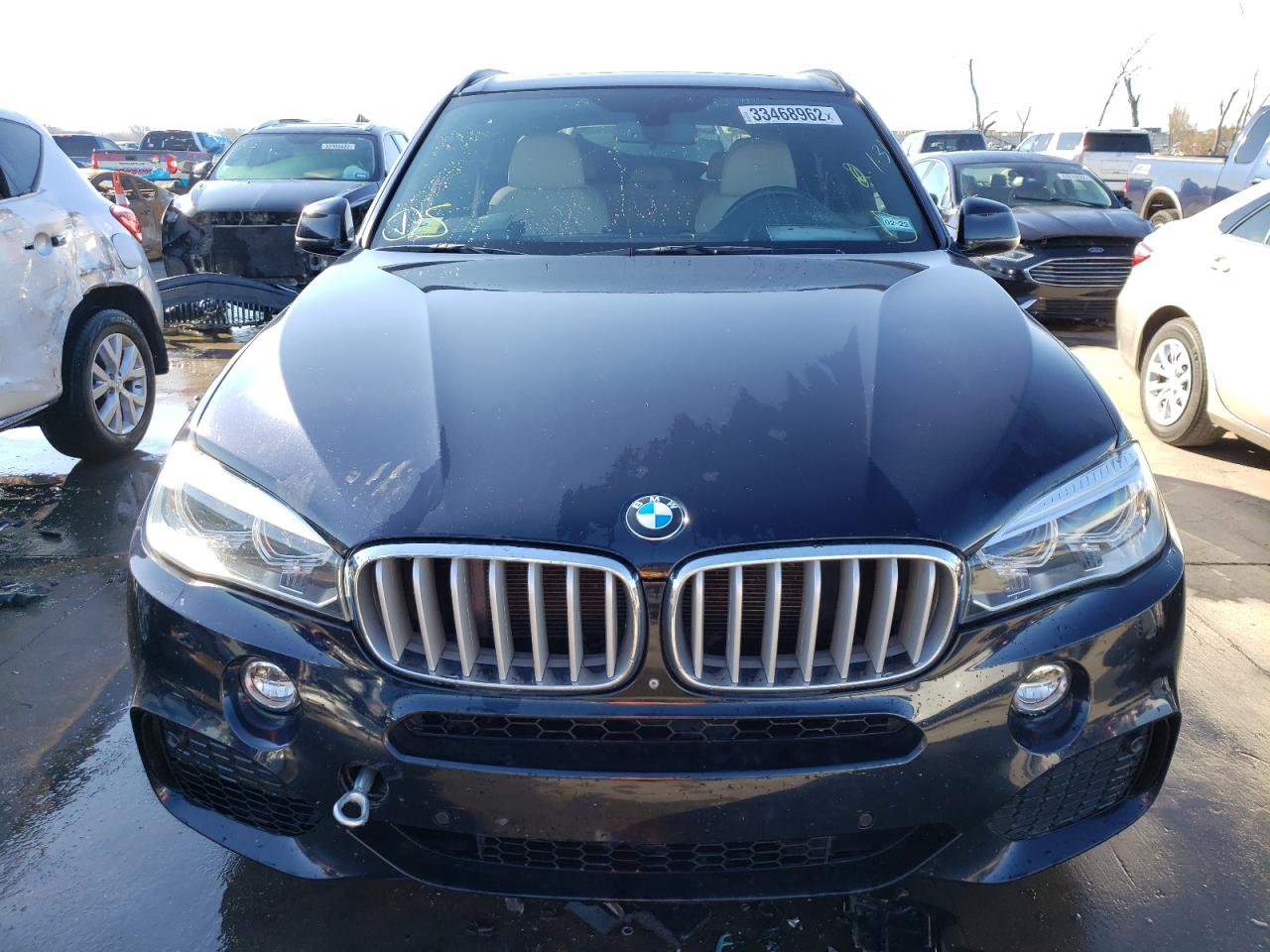 Photo 9 from auction – 2014 BMW X5 XDRIVE5 with VIN 5UXKR6C54E0J71686