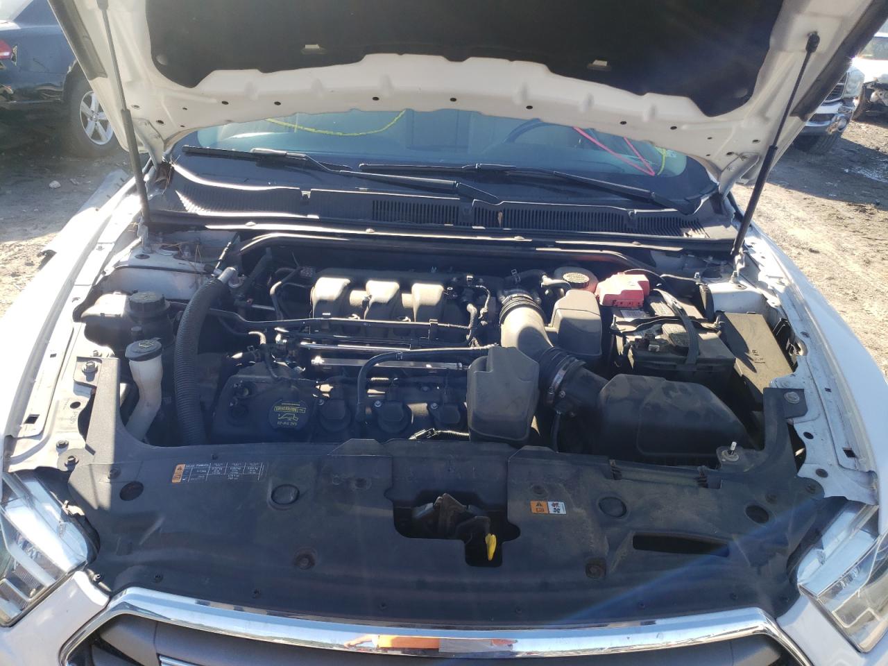 Photo 7 from auction – 2013 FORD TAURUS SEL with VIN 1FAHP2E80DG125608