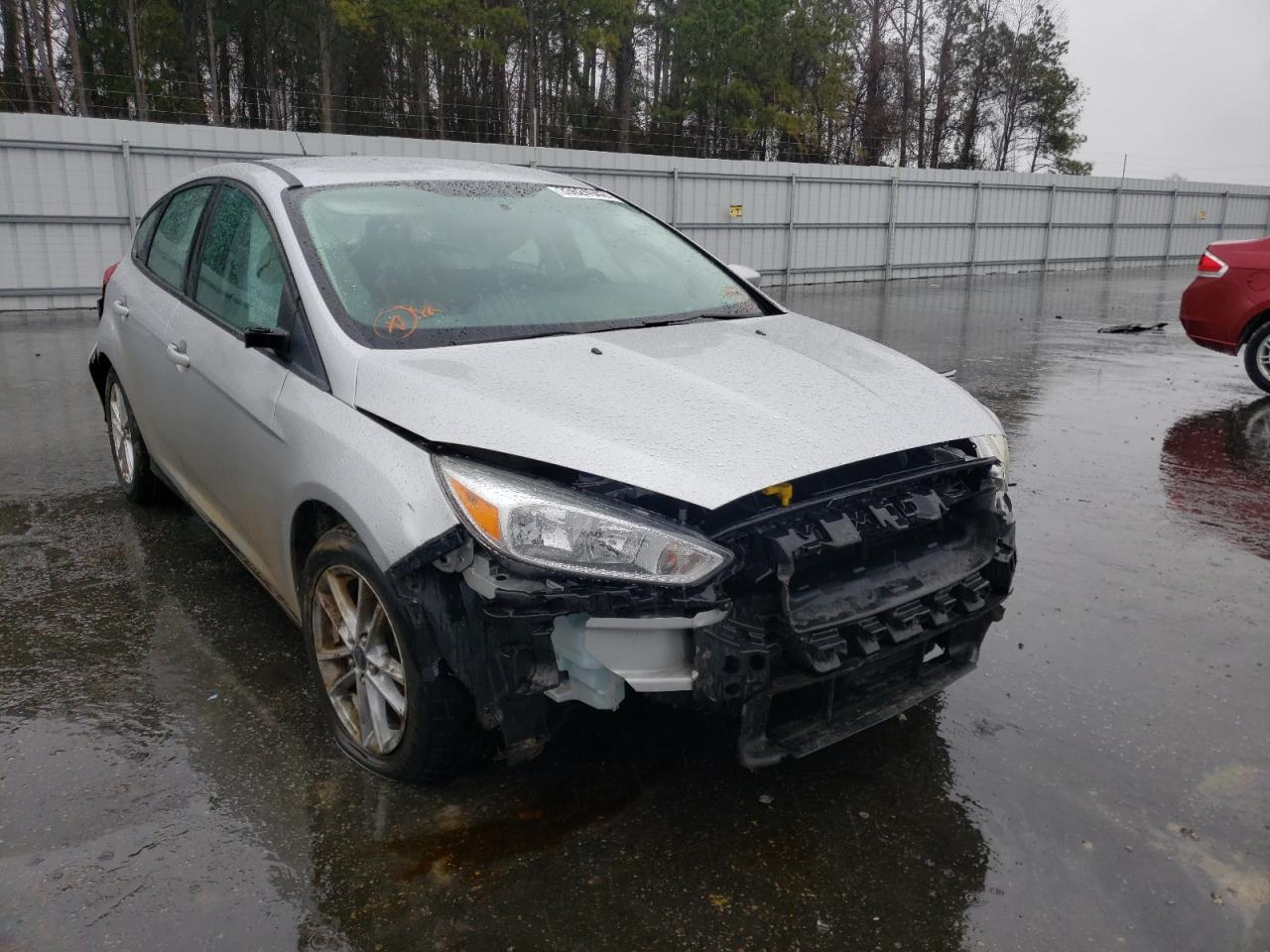 FORD FOCUS SE 2016 with VIN 1FADP3K22GL224043 - Photo from auction