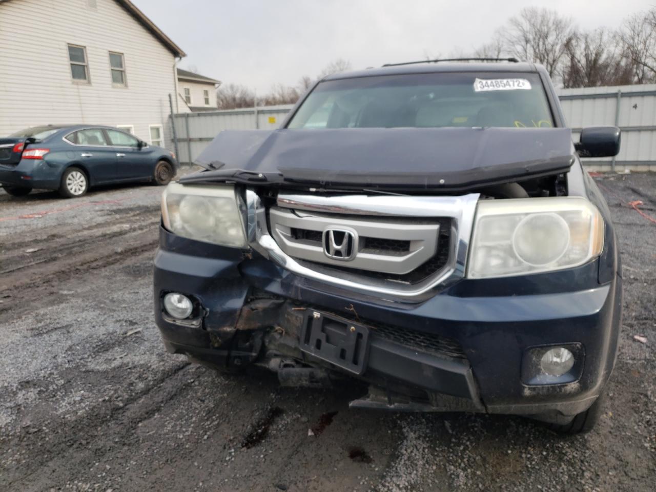 Photo 7 from auction – 2011 HONDA PILOT EXL with VIN 5FNYF4H50BB001808