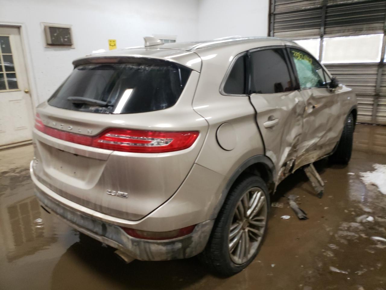 Photo 4 from auction – 2015 LINCOLN MKC with VIN 5LMTJ2AH9FUJ42576