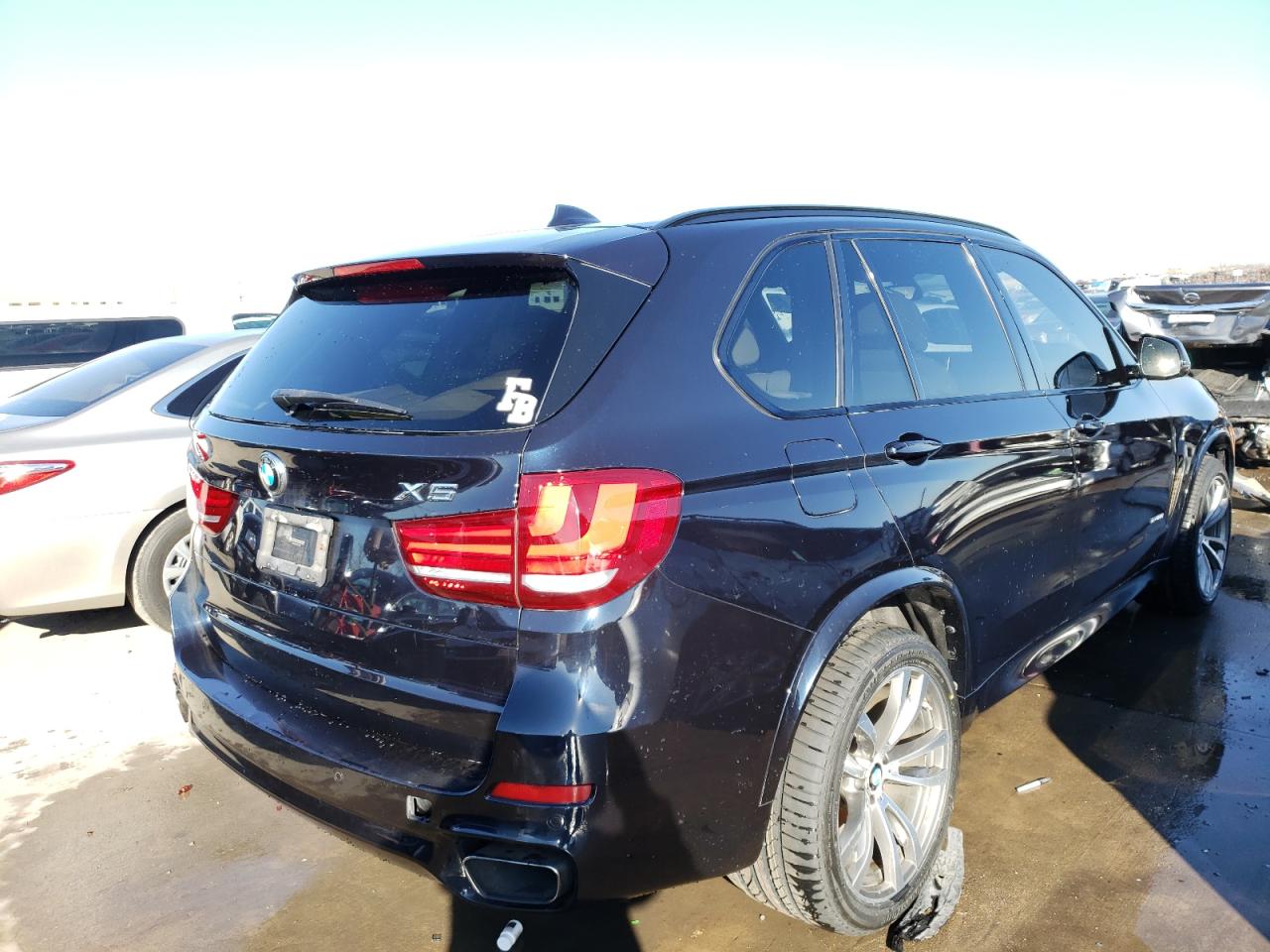 Photo 4 from auction – 2014 BMW X5 XDRIVE5 with VIN 5UXKR6C54E0J71686