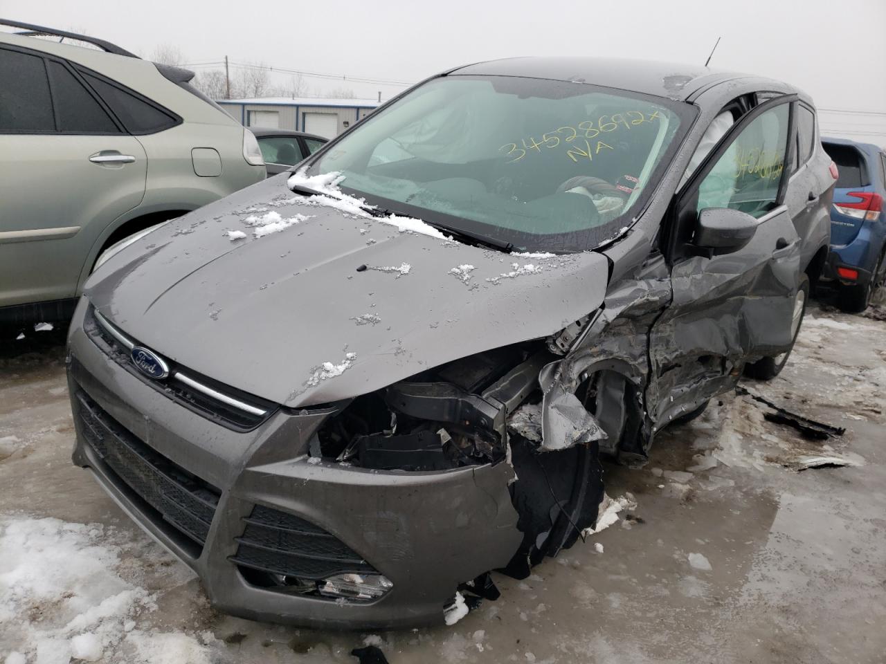 Photo 2 from auction – 2014 FORD ESCAPE SE with VIN 1FMCU9GX9EUD90634