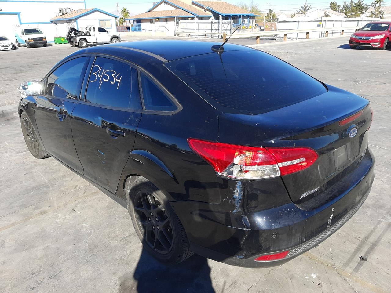 Photo 3 from auction – 2016 FORD FOCUS SE with VIN 1FADP3FE5GL315439