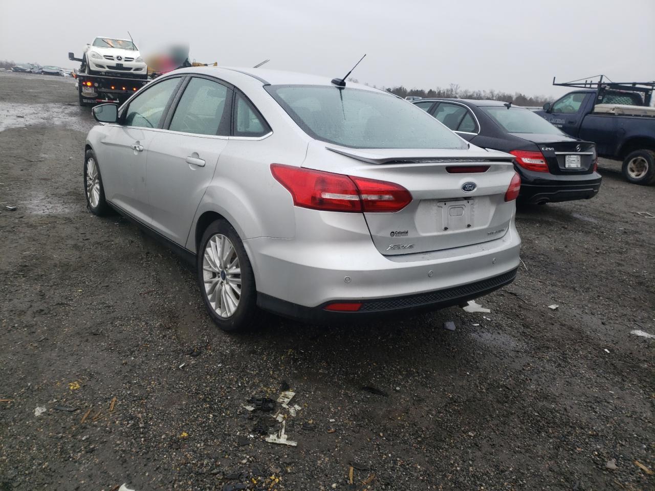 Photo 3 from auction – 2015 FORD FOCUS TITA with VIN 1FADP3J23FL228490