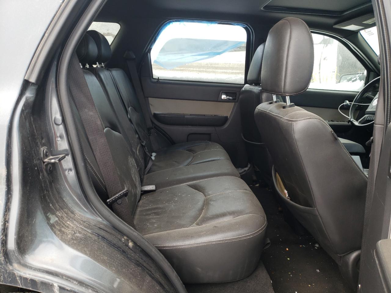 Photo 6 from auction – 2009 MERCURY MARINER PR with VIN 4M2CU87G89KJ08140