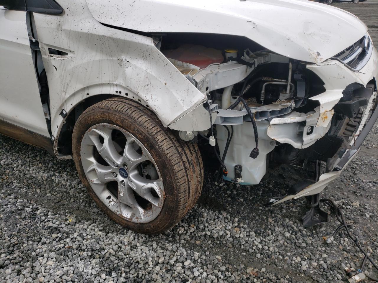Photo 9 from auction – 2013 FORD ESCAPE TIT with VIN 1FMCU9J90DUB52681