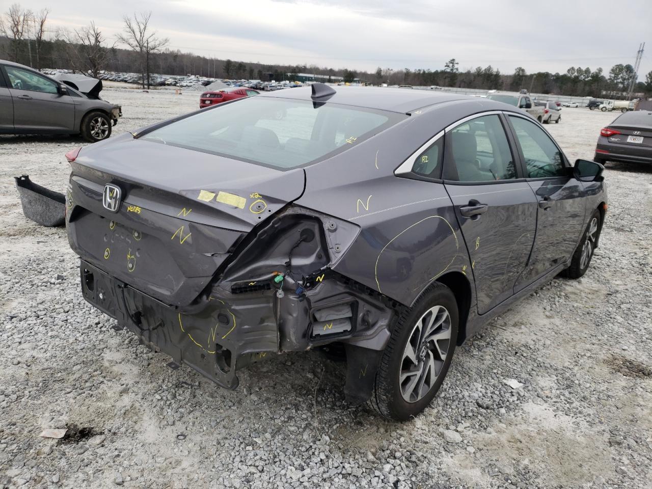 Photo 4 from auction – 2018 HONDA CIVIC EX with VIN 19XFC2F79JE035811