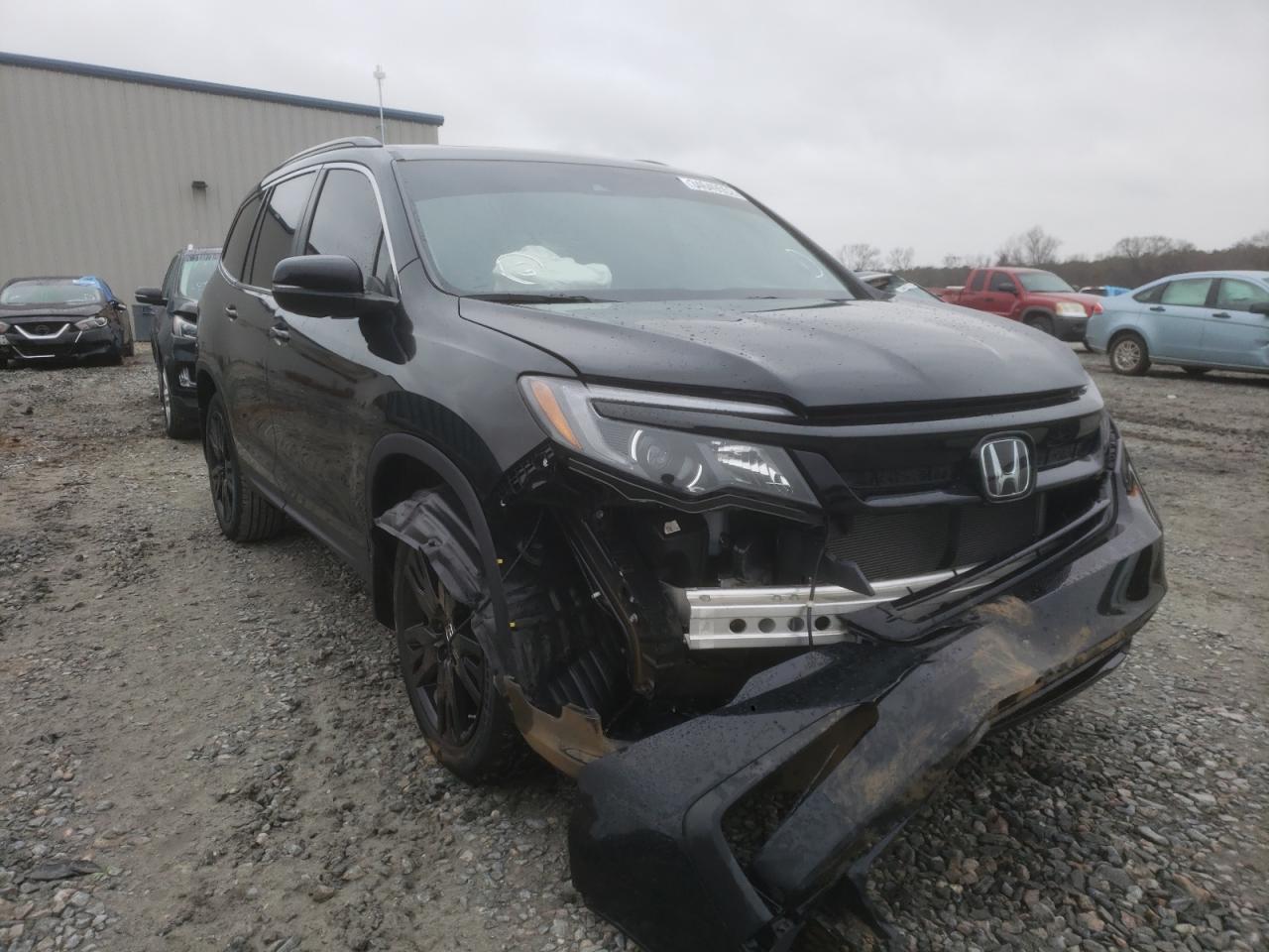 HONDA PILOT SE 2021 with VIN 5FNYF5H27MB028597 - Photo from auction