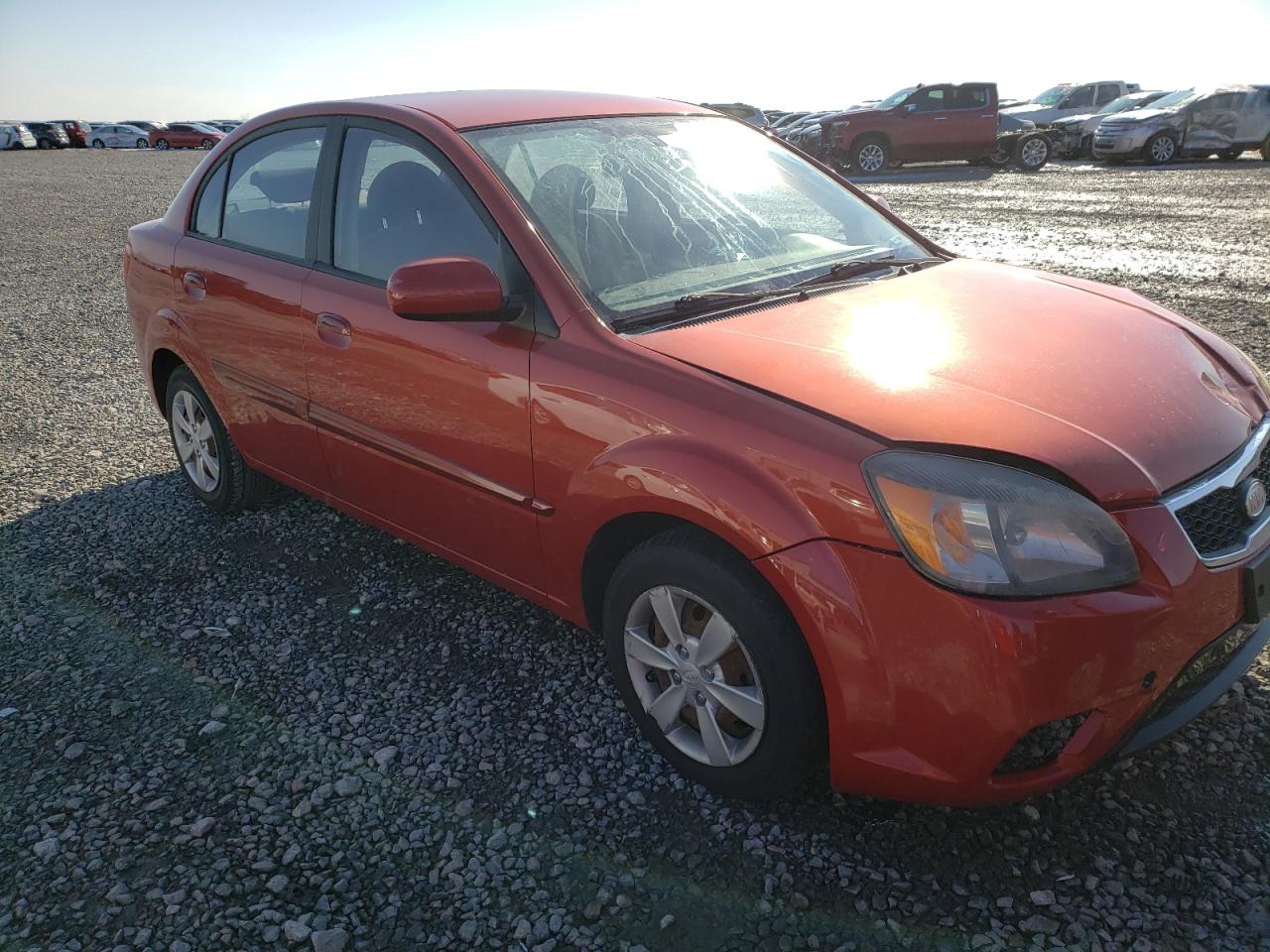 KIA RIO LX 2010 with VIN KNADH4A3XA6643106 - Photo from auction