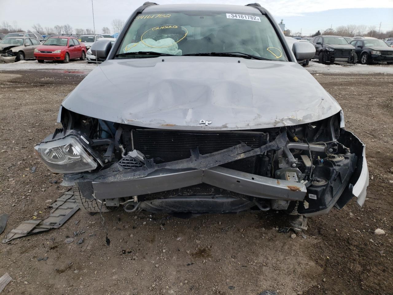 Photo 9 from auction – 2015 JEEP COMPASS LA with VIN 1C4NJDEB1FD270389