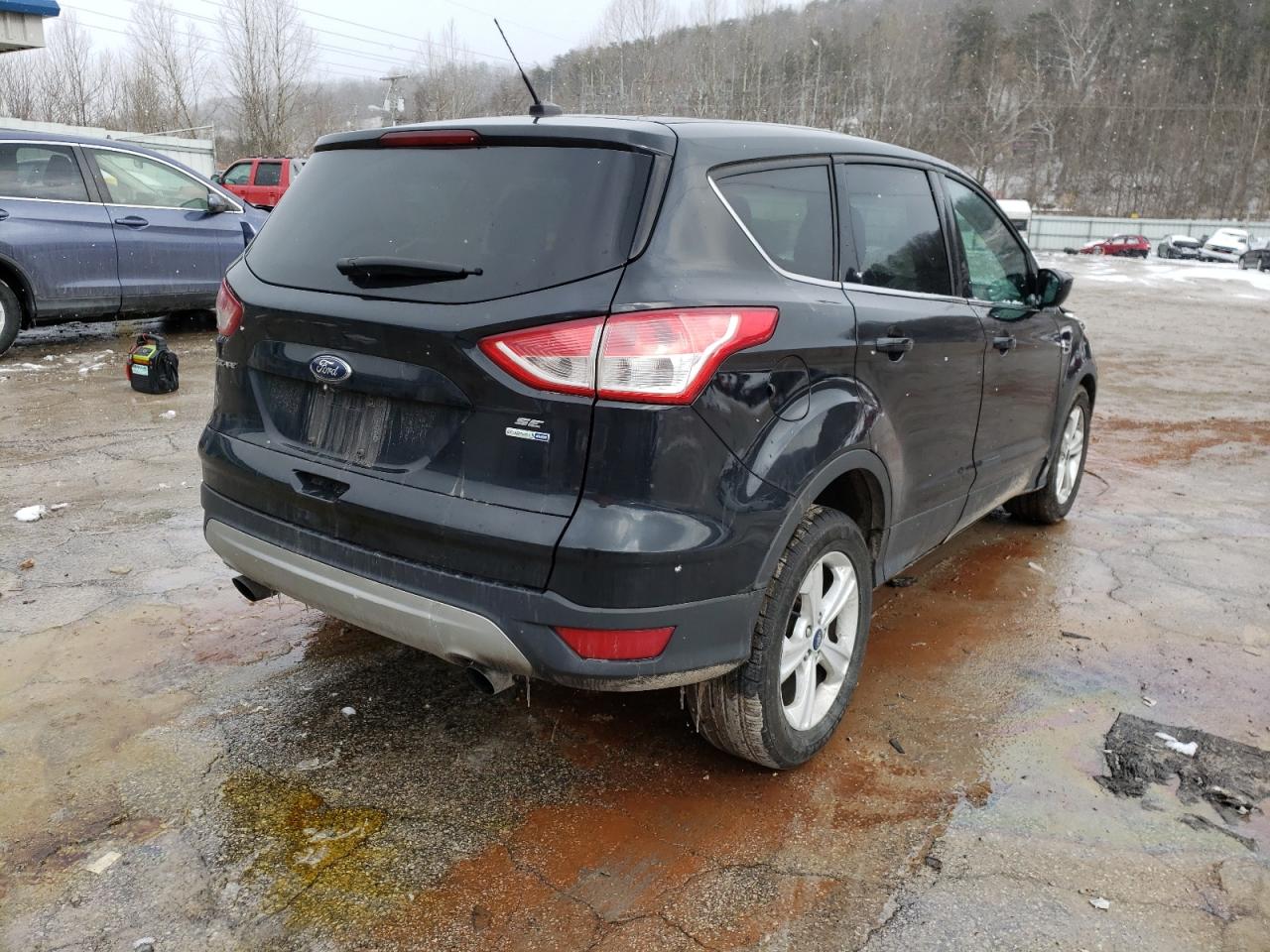 Photo 4 from auction – 2015 FORD ESCAPE SE with VIN 1FMCU9G92FUA67593