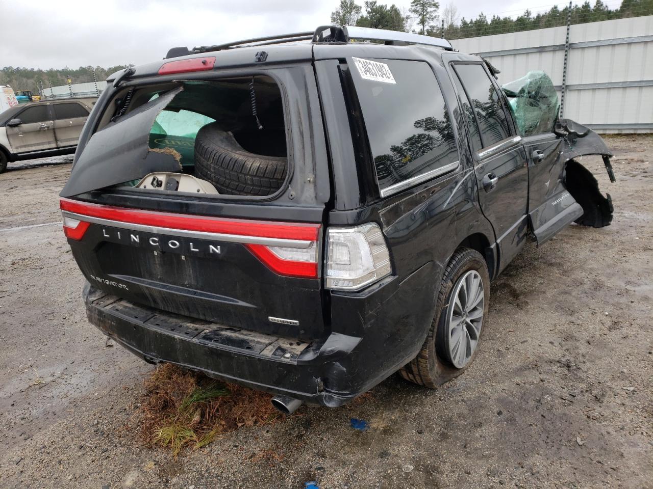 Photo 4 from auction – 2015 LINCOLN NAVIGATOR with VIN 5LMJJ2HT5FEJ08744