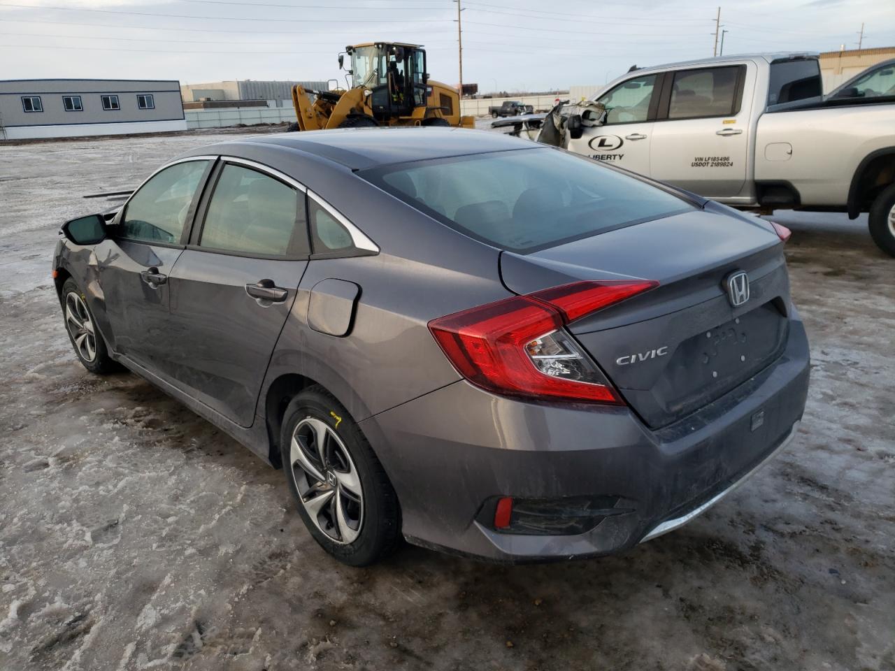 Photo 3 from auction – 2019 HONDA CIVIC LX with VIN 19XFC2F63KE028054