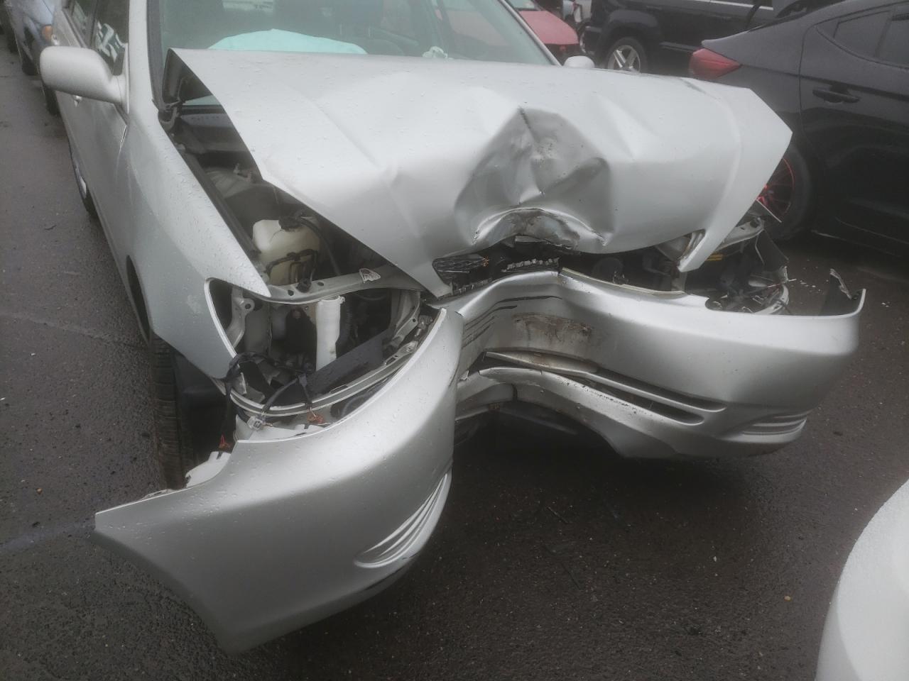 Photo 10 from auction – 2003 TOYOTA CAMRY LE with VIN 4T1BE32K03U139399