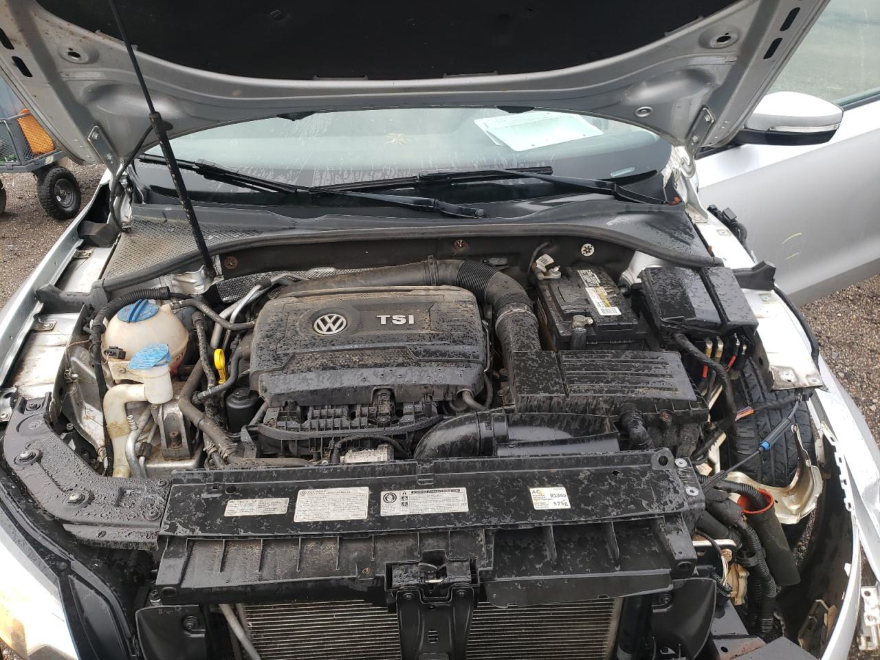 Photo 7 from auction – 2014 VOLKSWAGEN PASSAT S with VIN 1VWAT7A30EC060926