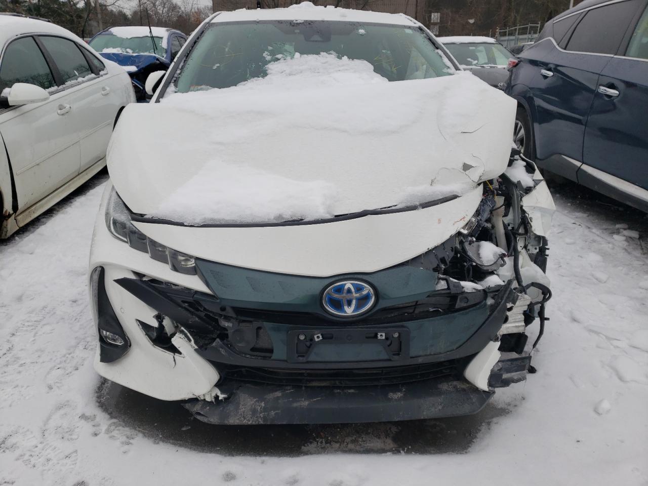 Photo 7 from auction – 2018 TOYOTA PRIUS PRIM with VIN JTDKARFP9J3077464