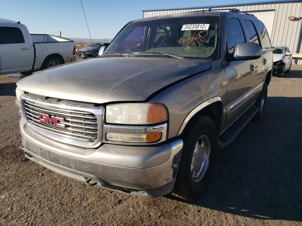 Photo 2 from auction – 2002 GMC YUKON with VIN 1GKEC13Z22R198080