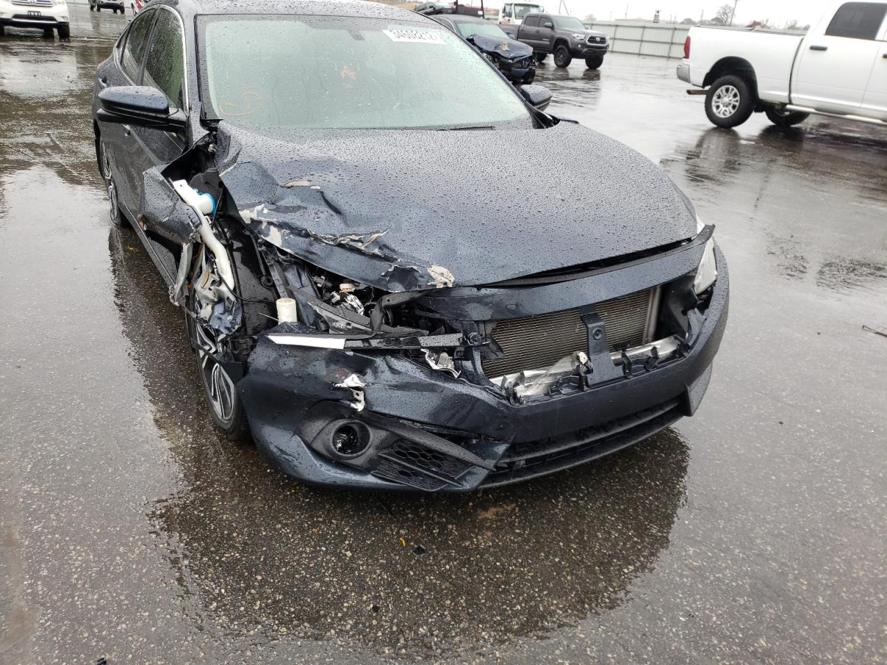 Photo 9 from auction – 2018 HONDA CIVIC EX with VIN JHMFC1F34JX038282