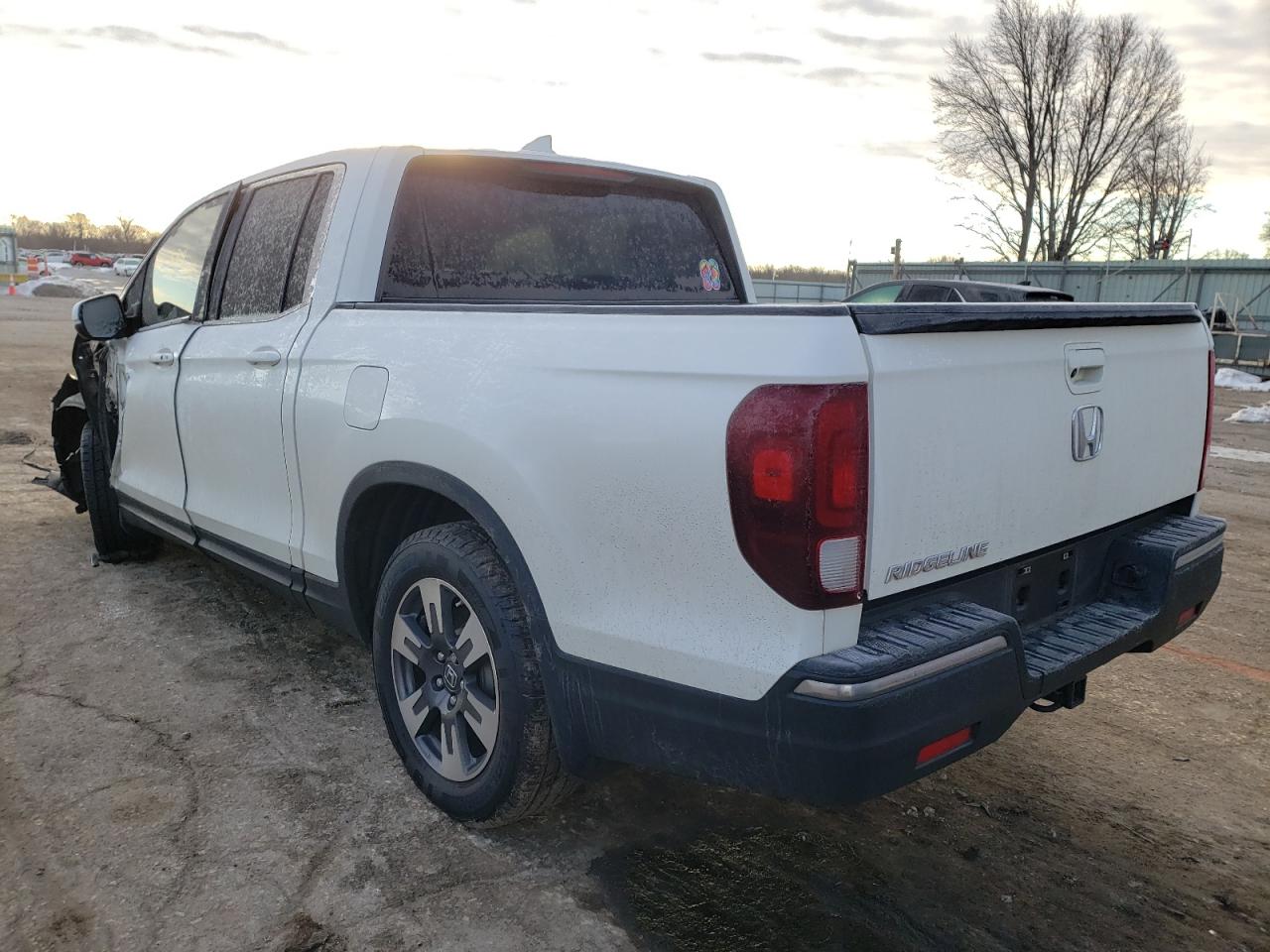 Photo 3 from auction – 2017 HONDA RIDGELINE with VIN 5FPYK2F57HB007575