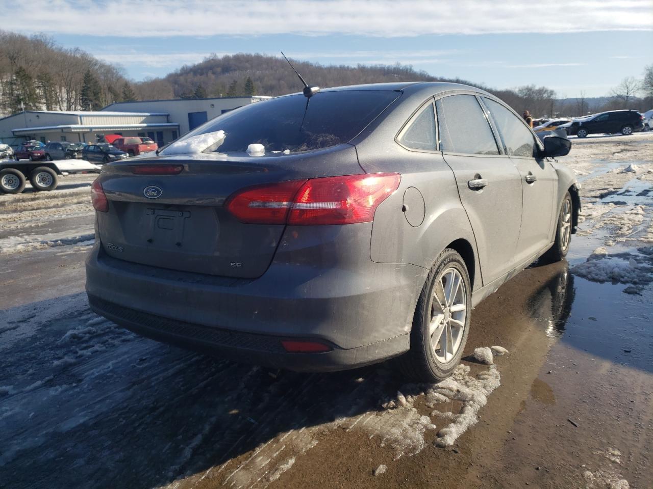 Photo 4 from auction – 2016 FORD FOCUS SE with VIN 1FADP3F26GL400991