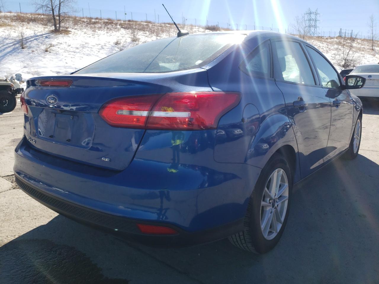 Photo 4 from auction – 2018 FORD FOCUS SE with VIN 1FADP3F28JL230043