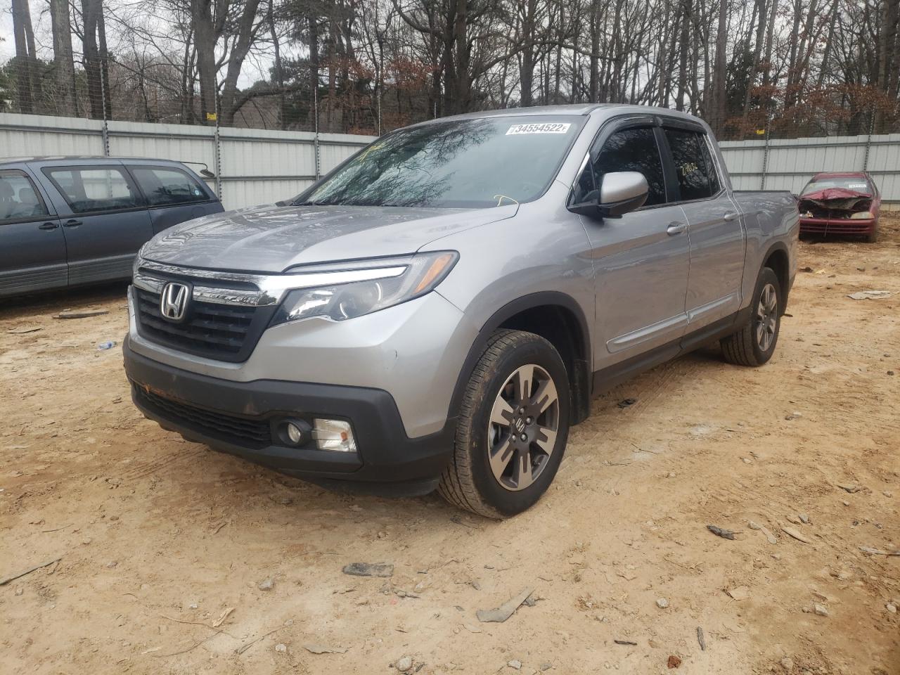 Photo 2 from auction – 2019 HONDA RIDGELINE with VIN 5FPYK3F56KB044145