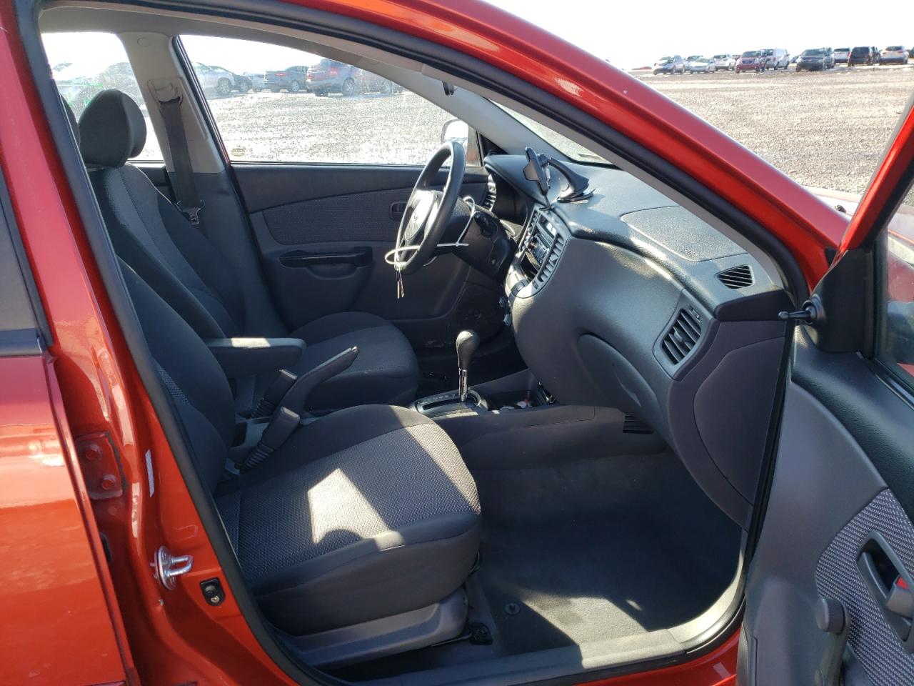 Photo 5 from auction – 2010 KIA RIO LX with VIN KNADH4A3XA6643106