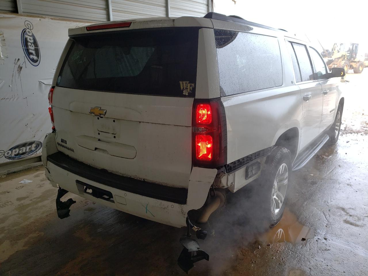 Photo 4 from auction – 2016 CHEVROLET SUBURBAN K with VIN 1GNSKHKC3GR299148