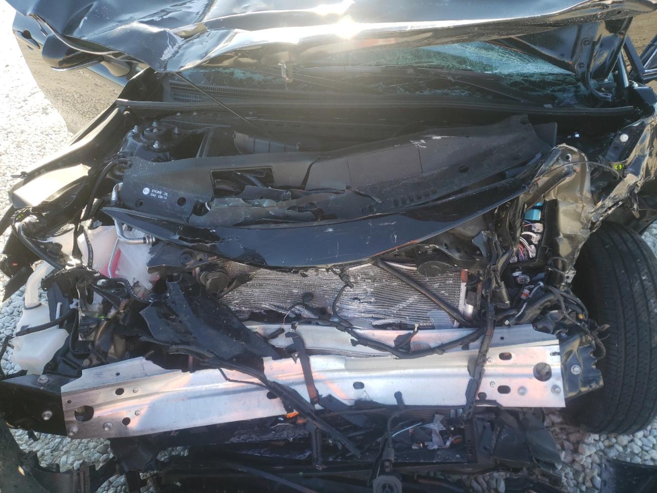Photo 7 from auction – 2021 TOYOTA CAMRY LE with VIN 4T1C31AK2MU558615