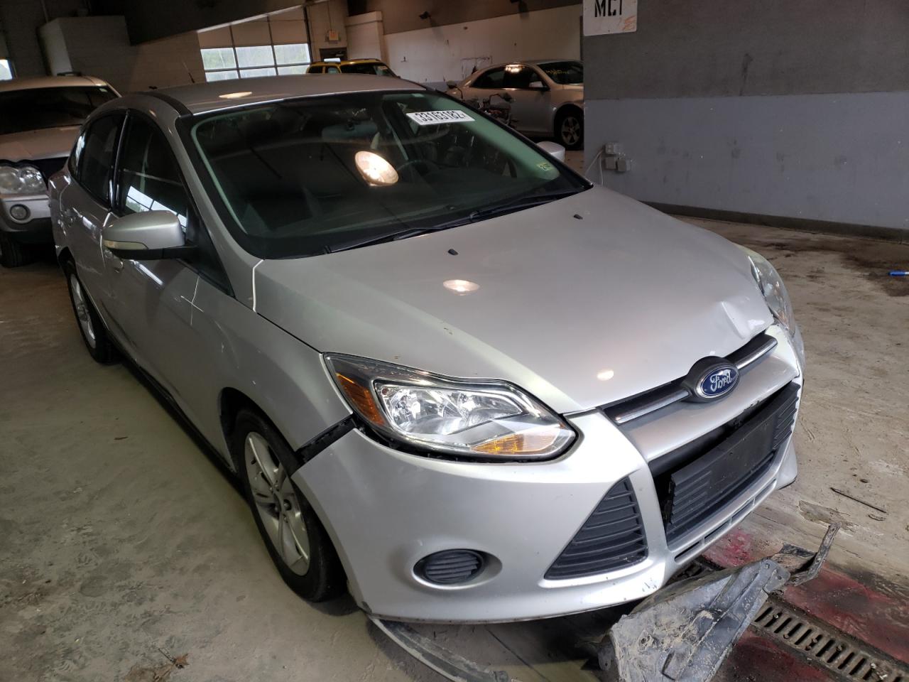FORD FOCUS SE 2014 with VIN 1FADP3F2XEL421758 - Photo from auction
