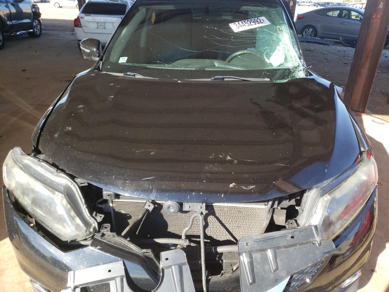 Photo 7 from auction – 2014 NISSAN ROGUE S with VIN 5N1AT2MT9EC854708