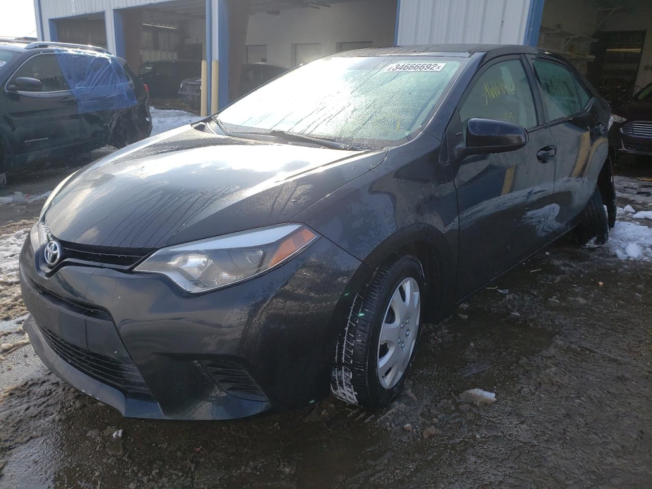 Photo 2 from auction – 2014 TOYOTA COROLLA L with VIN 5YFBURHE7EP002665