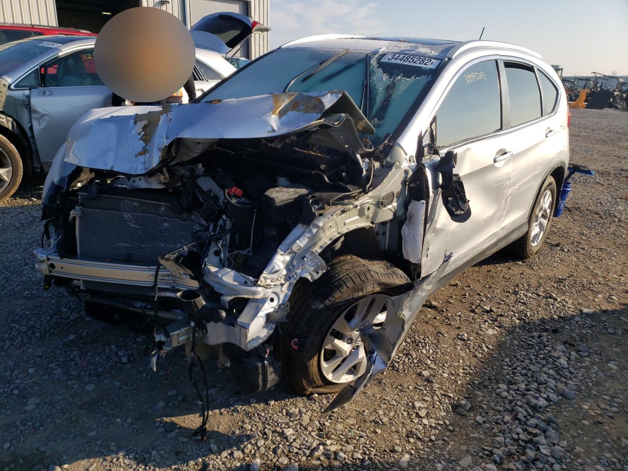 Photo 9 from auction – 2015 HONDA CR-V EXL with VIN 2HKRM4H76FH663282