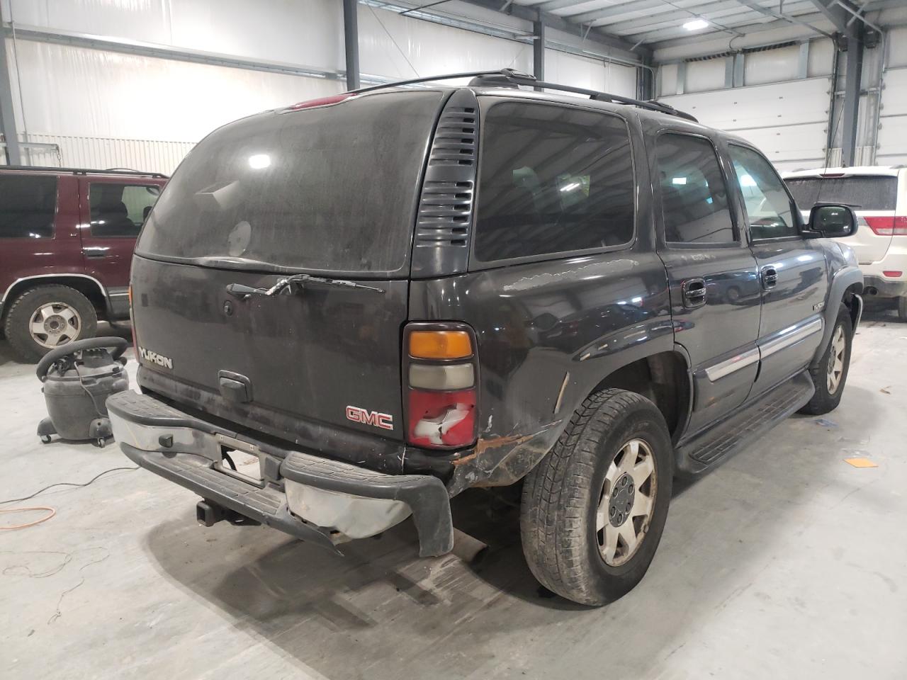 Photo 4 from auction – 2004 GMC YUKON with VIN 1GKEK13V94J269759
